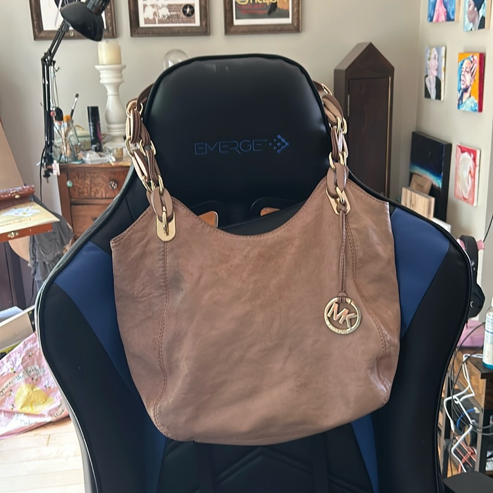 Michael Kors leather boho satchel purse with chain detailing on straps
